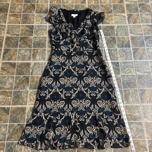 Elegant Black and Beige Patterned Dress
